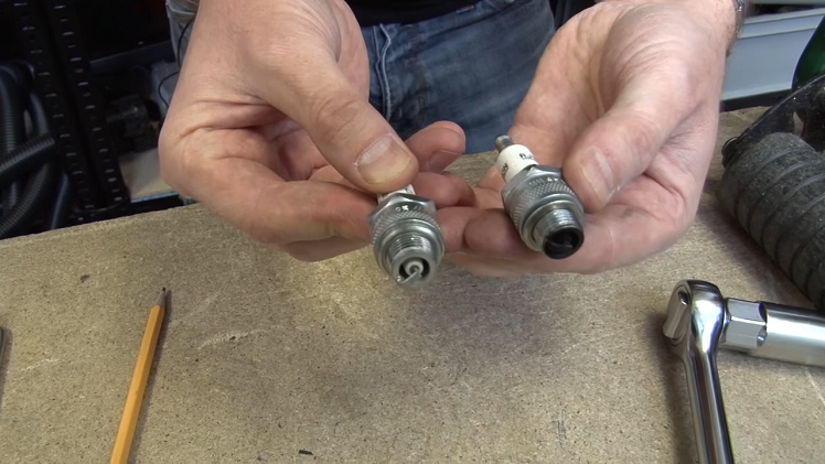 The Difference Between A New Spark Plug And One That Has Seen Use