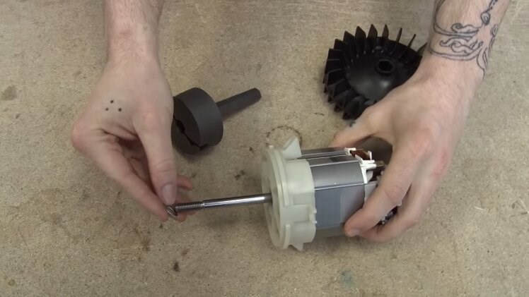 Transferring The Small Washer From The Old Motor Spindle Onto The New Motor Spindle