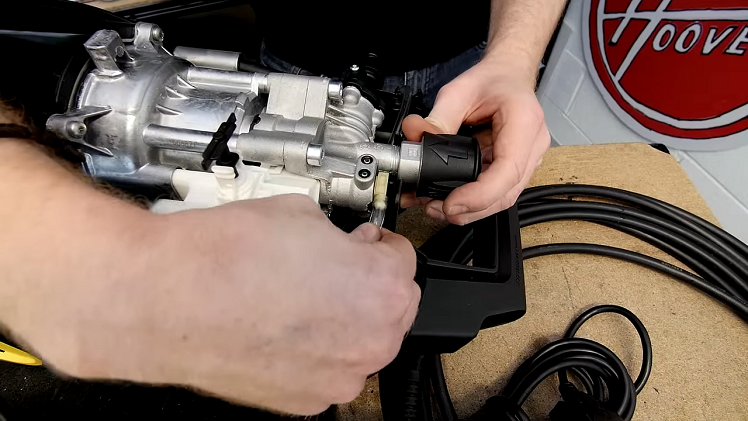 Reattaching The Detergent Hose To The Motor Assembly