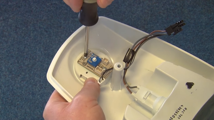 Slotting The New PCB Onto The Temperature Knob's Spindle Inside The Unit, Then Screwing It Into Place With Two Screws