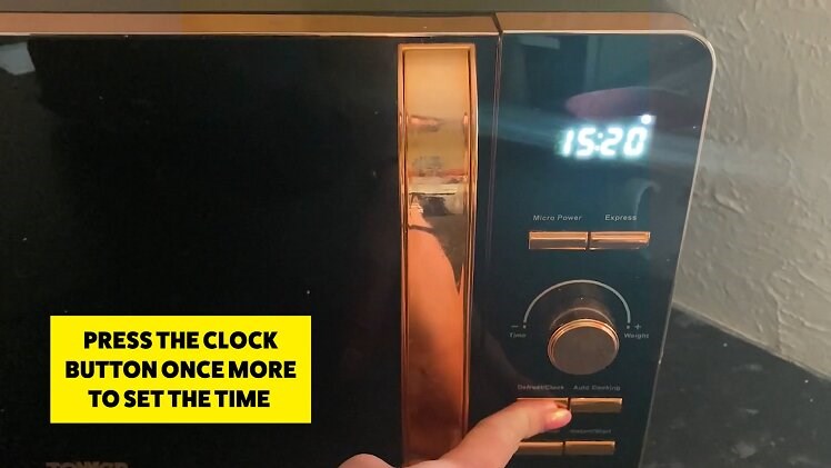 Press the 'clock' button to exit clock-changing mode and finish setting the time