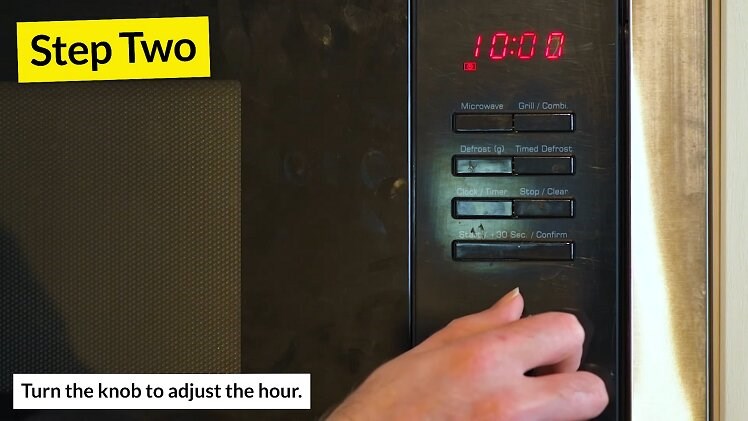 Turn the microwave's control knob to change the hour on the digital clock