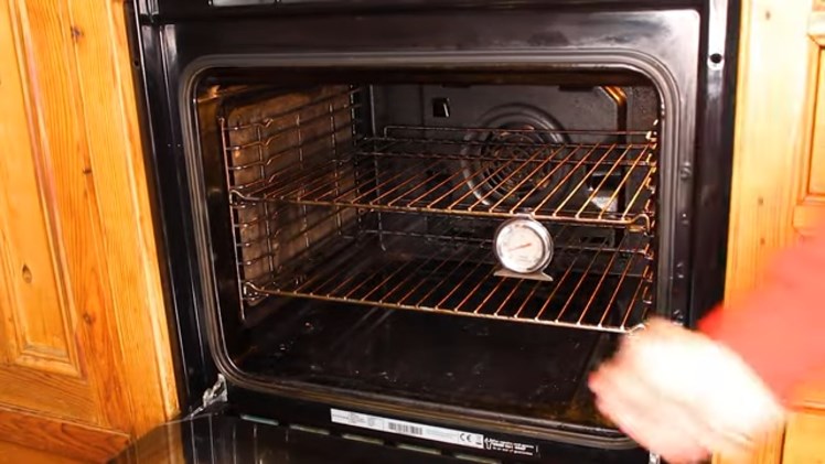 Hooking The Thermometer On One Of The Oven Shelves