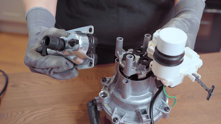 Now it's time to refit the pump assembly onto the top of the motor. 